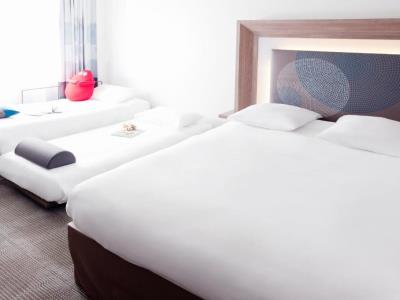 bedroom - hotel novotel paris st. denis stade basilique - st denis, france