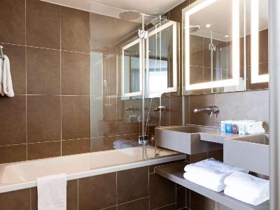 bathroom - hotel novotel paris st. denis stade basilique - st denis, france