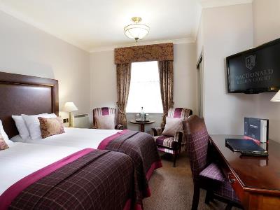 bedroom 1 - hotel macdonald kilhey court hotel and spa - wigan, united kingdom