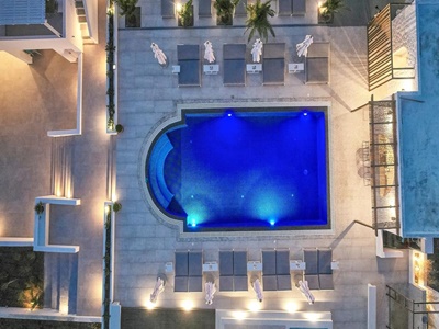 outdoor pool - hotel petri suites - santorini, greece