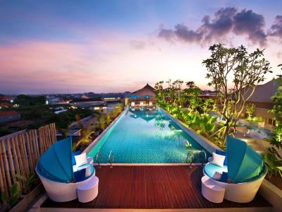 outdoor pool - hotel ramada by wyndham bali sunset road kuta - bali island, indonesia