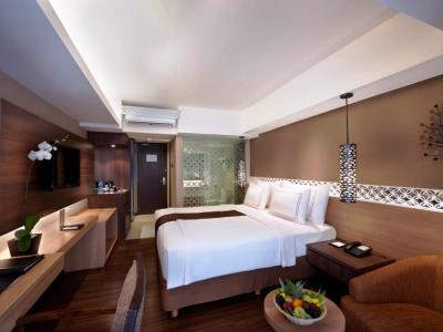 bedroom 1 - hotel ramada by wyndham bali sunset road kuta - bali island, indonesia