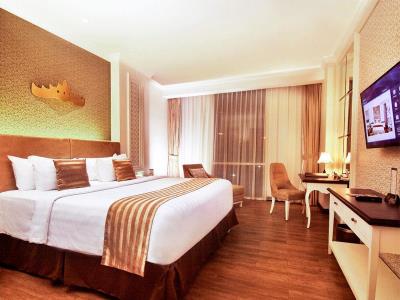 deluxe room - hotel swiss-belhotel lampung - bandar lampung, indonesia