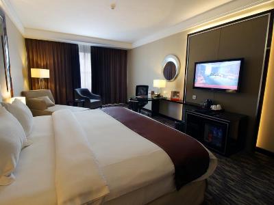 bedroom 1 - hotel swiss-belhotel harbour bay - batam, indonesia