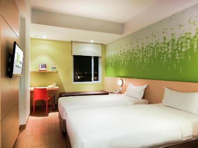 bedroom 1 - hotel zest hotel harbour bay batam - batam, indonesia