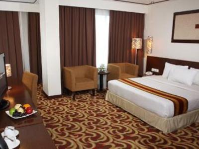 deluxe room - hotel swiss-beliin baloi batam - batam, indonesia