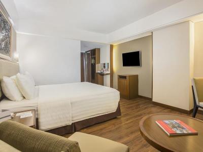 deluxe room 1 - hotel swiss-belhotel bogor - bogor, indonesia