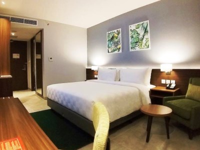 deluxe room - hotel swiss-belinn bogor - bogor, indonesia