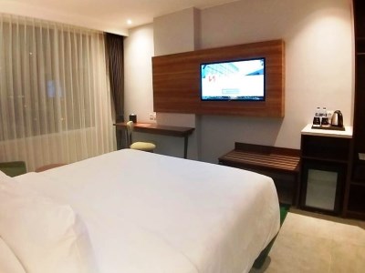 deluxe room 1 - hotel swiss-belinn bogor - bogor, indonesia