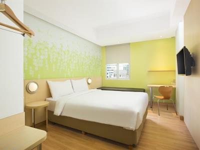 bedroom - hotel zest bogor - bogor, indonesia