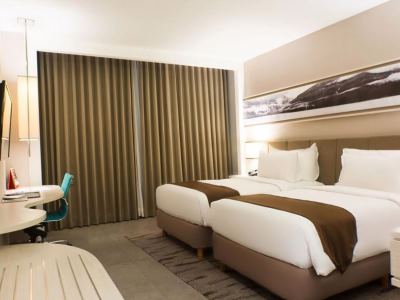 bedroom 1 - hotel swiss-belhotel jambi - jambi, indonesia