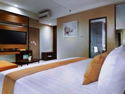 bedroom - hotel aston inn mataram - lombok, indonesia