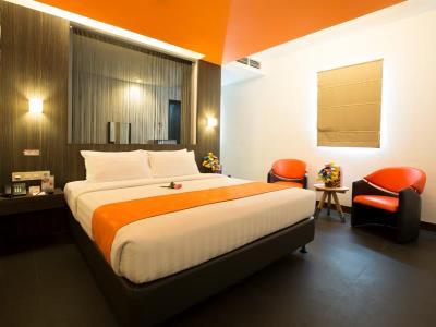 deluxe room - hotel swiss-belinn medan - medan, indonesia