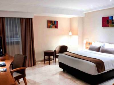 deluxe room - hotel aryaduta palembang - palembang, indonesia