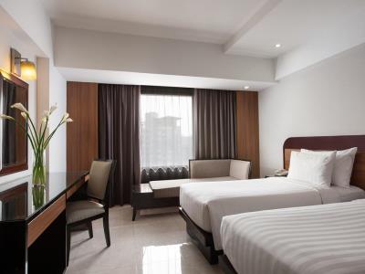 bedroom 1 - hotel hotel santika premiere semarang - semarang, indonesia