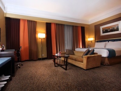 bedroom 1 - hotel ciputra semarang by swiss-belhotel intl - semarang, indonesia