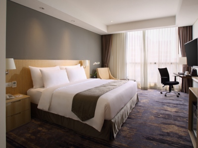 bedroom - hotel hotel grandhika pemuda semarang - semarang, indonesia
