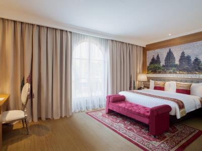 bedroom - hotel ramada suites by wyndham solo - surakarta, indonesia