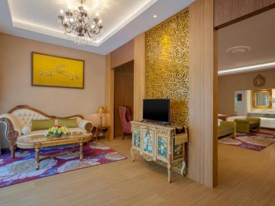 bedroom 1 - hotel ramada suites by wyndham solo - surakarta, indonesia