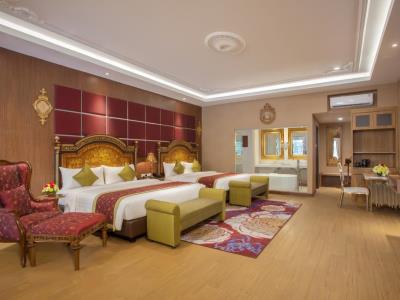 bedroom 2 - hotel ramada suites by wyndham solo - surakarta, indonesia