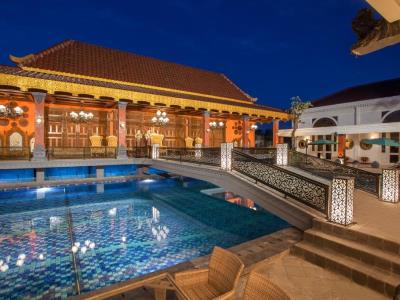 outdoor pool - hotel ramada suites by wyndham solo - surakarta, indonesia