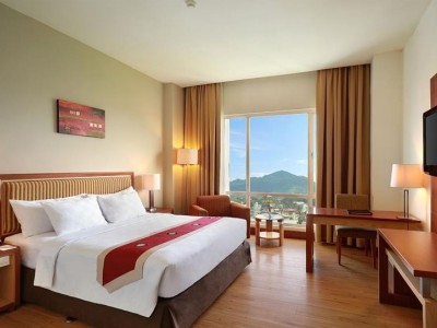 deluxe room - hotel swiss-belhotel maleosan manado - manado, indonesia