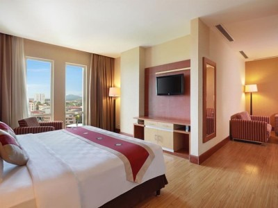 junior suite - hotel swiss-belhotel maleosan manado - manado, indonesia