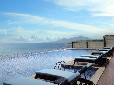 outdoor pool - hotel four points by sheraton manado - manado, indonesia