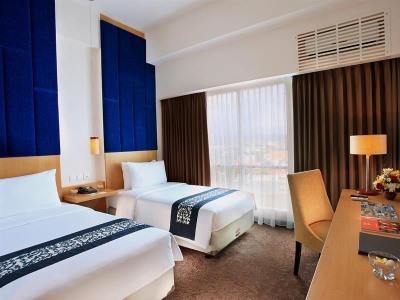 bedroom 1 - hotel swiss-belinn malang - malang, indonesia