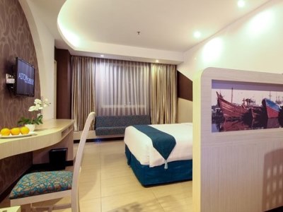 deluxe room - hotel aston cirebon hotel n convention center - cirebon, indonesia