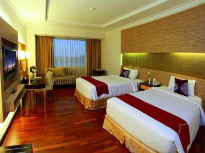 bedroom - hotel premier basko - padang, indonesia