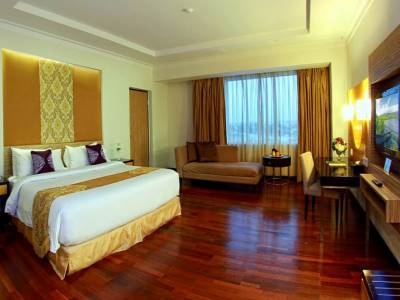 deluxe room - hotel premier basko - padang, indonesia