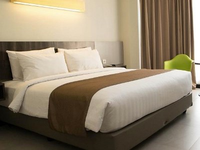 deluxe room - hotel swiss-belhotel borneo samarinda - samarinda, indonesia