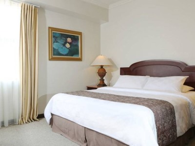 bedroom - hotel aryaduta suites semanggi - jakarta, indonesia