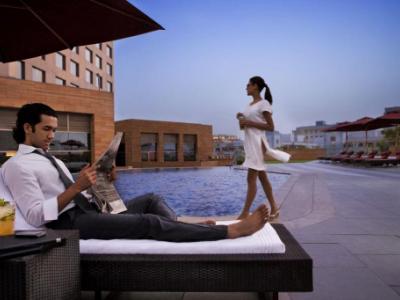 outdoor pool - hotel courtyard gurugram downtown - gurugram, india