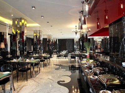 restaurant 1 - hotel radisson blu paschim vihar - new delhi, india