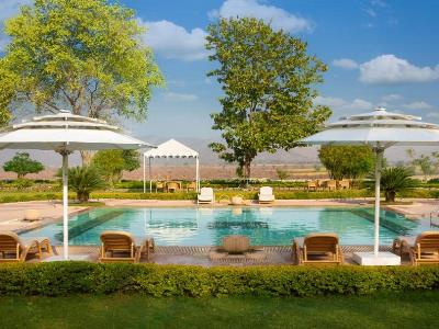 outdoor pool - hotel gateway hotel ramgarh lodge - jaipur, india