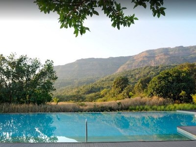 outdoor pool - hotel hilton shillim estate retreat - pune, india