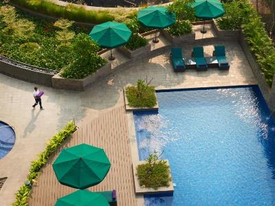 outdoor pool - hotel conrad pune - pune, india