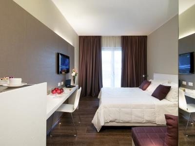 bedroom - hotel isola sacra rome airport - fiumicino, italy