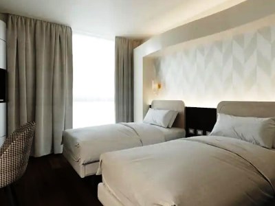 bedroom - hotel doubletree by hilton milan malpensa - solbiate olona, italy