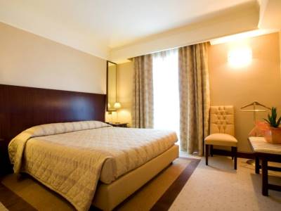bedroom 1 - hotel grand hotel olimpo - alberobello, italy