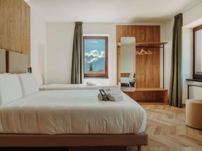 bedroom 1 - hotel b and b hotel passo tre croci cortina - cortina d'ampezzo, italy