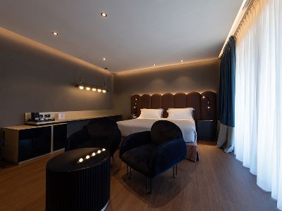 bedroom - hotel la suite - matera, italy