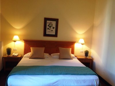 bedroom - hotel del real orto botanico - naples, italy