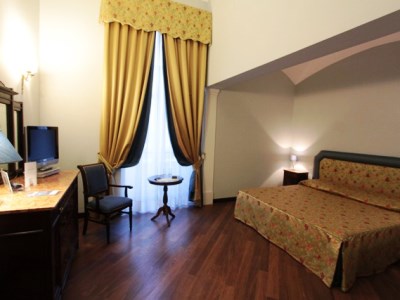 bedroom - hotel decumani hotel de charme - naples, italy