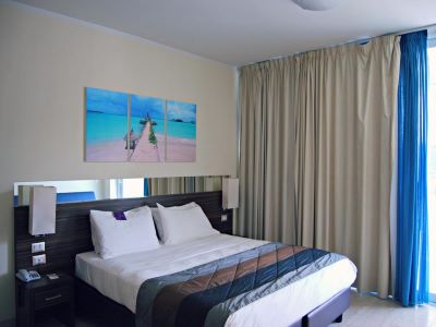 bedroom 1 - hotel mercure rimini lungomare - rimini, italy
