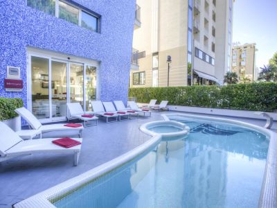 outdoor pool 1 - hotel mercure rimini lungomare - rimini, italy