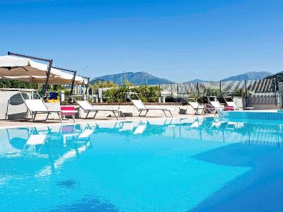 outdoor pool 1 - hotel novotel salerno est arechi - salerno, italy