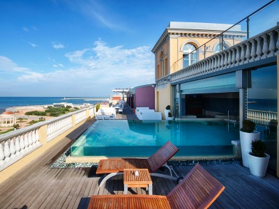 outdoor pool - hotel grand hotel palazzo - livorno, italy